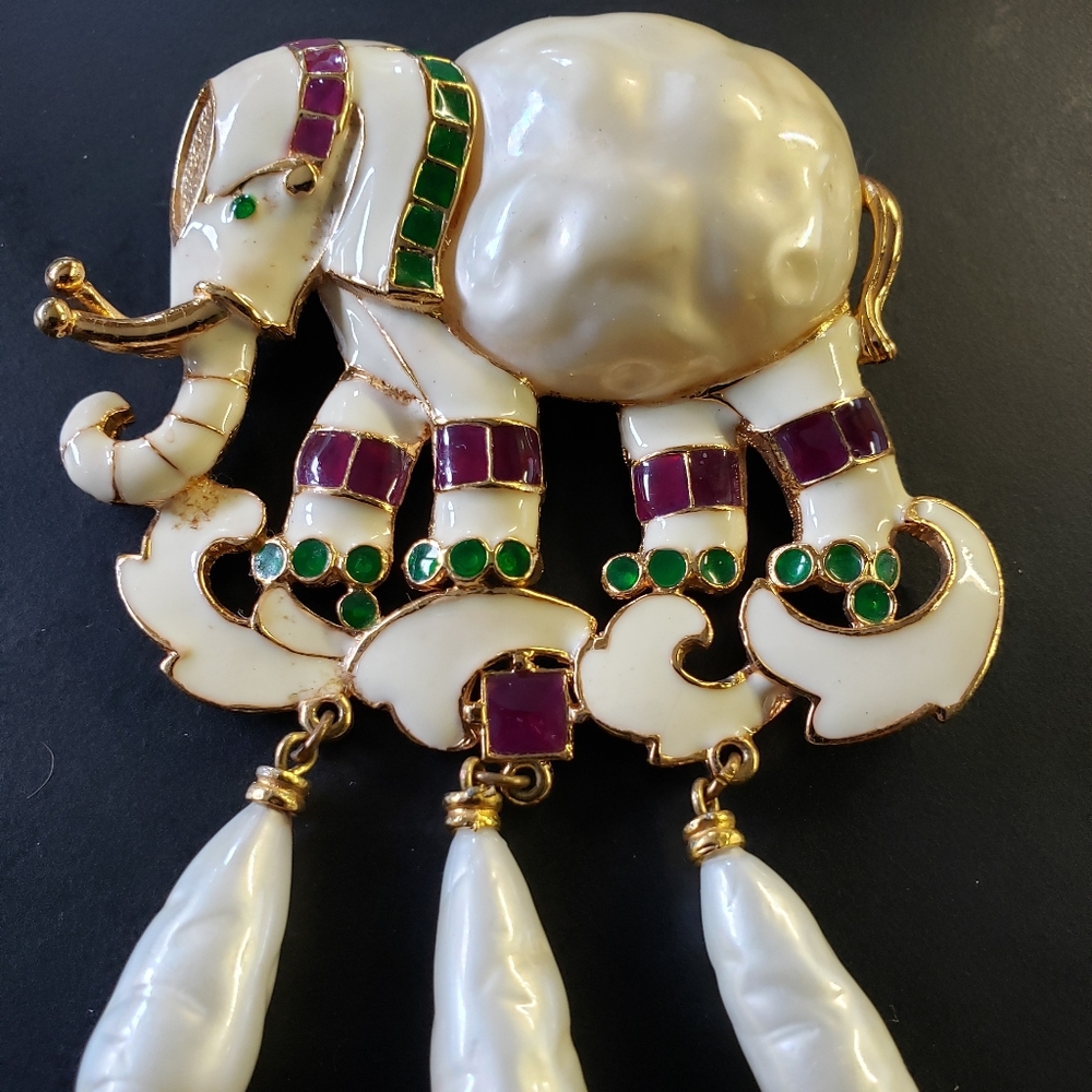 Vintage signed Hattie Carnegie elephant brooch/necklace. 2 Sold on eBay for$425.